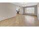 Dining area adjacent to kitchen featuring tile flooring and natural light at 1712 E Manhatton Dr, Tempe, AZ 85282