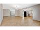 Open floor plan with tile flooring connects living room to kitchen at 1712 E Manhatton Dr, Tempe, AZ 85282