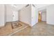 Bright living room with tile flooring, neutral walls, and a view of the entryway at 1712 E Manhatton Dr, Tempe, AZ 85282