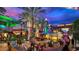Relaxing outdoor lounge area with modern seating, perfect for socializing in a vibrant shopping center at 1712 E Manhatton Dr, Tempe, AZ 85282