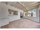 Enclosed sunroom provides bright light and backyard views at 1712 E Manhatton Dr, Tempe, AZ 85282