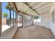 Sunroom offers bright light and access to the backyard at 1712 E Manhatton Dr, Tempe, AZ 85282