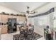 Charming breakfast nook featuring a round table, comfortable seating, and natural light at 17543 N Rainbow Cir, Surprise, AZ 85374