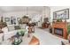 Inviting living room showcasing a fireplace, dining area, and neutral color palette at 17543 N Rainbow Cir, Surprise, AZ 85374