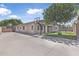 Rear exterior of home featuring a basketball court at 18998 E Lark Dr, Queen Creek, AZ 85142
