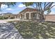 Attractive house showcasing desert landscaping, and an attached garage at 18998 E Lark Dr, Queen Creek, AZ 85142