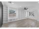 Stylish living room featuring luxury vinyl plank flooring, recessed lights, and built-in shelving at 18998 E Lark Dr, Queen Creek, AZ 85142