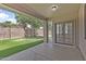 Covered patio looks out onto the spacious backyard and basketball court at 18998 E Lark Dr, Queen Creek, AZ 85142