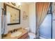 Bathroom featuring a granite countertop vanity and glass-enclosed shower at 2041 E Palm Beach Dr, Chandler, AZ 85249
