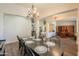 Formal dining room with chandelier, dining table set for entertaining guests at 2041 E Palm Beach Dr, Chandler, AZ 85249
