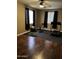 A well-equipped exercise room featuring a treadmill, weights, and an exercise ball offers a convenient fitness space at 2041 E Palm Beach Dr, Chandler, AZ 85249