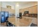 Modern kitchen with granite countertops, stainless steel appliances, and ample cabinetry at 2041 E Palm Beach Dr, Chandler, AZ 85249