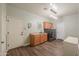 Functional laundry room with modern washer/dryer units, a sink, and ample storage at 2041 E Palm Beach Dr, Chandler, AZ 85249