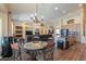 Open-concept living space features a kitchen, fireplace, dining area, and comfortable seating at 2041 E Palm Beach Dr, Chandler, AZ 85249