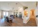 Spacious living room features wood floors, fireplace, and entertainment center at 2041 E Palm Beach Dr, Chandler, AZ 85249