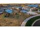 Community playground area with swings, slides, and a splash pad in a Gathering-friendly environment at 22682 E Indiana Ave, Queen Creek, AZ 85142