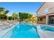 Beautiful backyard showcasing a refreshing pool, a relaxing spa, and a well-maintained patio area at 24645 N 65Th Ave, Glendale, AZ 85310