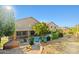 Charming backyard featuring a private pool, covered patio, and mature landscaping, perfect for outdoor living at 24645 N 65Th Ave, Glendale, AZ 85310