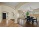 Formal dining room with decorative columns and ample space for entertaining, perfect for Gathering gatherings at 24645 N 65Th Ave, Glendale, AZ 85310