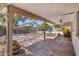 Covered back patio with stamped concrete flooring, ceiling fan, and backyard views at 2755 W Calle Del Norte --, Chandler, AZ 85224