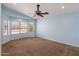 Spacious bedroom features large windows, neutral carpet, and ample natural light at 2755 W Calle Del Norte --, Chandler, AZ 85224