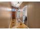 Inviting entryway with hardwood floors, pendant lights, and a stylish front door at 2755 W Calle Del Norte --, Chandler, AZ 85224