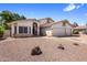 Charming single-Gathering home featuring desert landscaping, a tile roof, and a two-car garage at 2755 W Calle Del Norte --, Chandler, AZ 85224