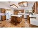 Bright kitchen showcasing a center island with seating and plenty of counter space at 2755 W Calle Del Norte --, Chandler, AZ 85224