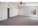 Large main bedroom features neutral carpet and walk-in closets at 2755 W Calle Del Norte --, Chandler, AZ 85224