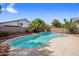 Inviting backyard pool with a Baja shelf and lush landscaping provides a private oasis at 2755 W Calle Del Norte --, Chandler, AZ 85224