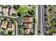 Birds-eye view of homes showcasing backyard pools and proximity to neighborhood streets at 29302 N 126Th Ln, Peoria, AZ 85383