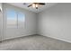 Carpeted bedroom offers natural light through a window at 29302 N 126Th Ln, Peoria, AZ 85383