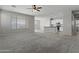 Comfortable living area featuring plush carpet, and open concept at 29302 N 126Th Ln, Peoria, AZ 85383