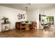 Bright dining area with a marble table, comfortable seating, and stylish decor at 3186 E Stella Ln, Phoenix, AZ 85016