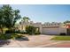 Southwestern home showing desert landscaping, brick driveway, garage and a stucco exterior at 3186 E Stella Ln, Phoenix, AZ 85016