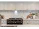 Kitchen features stylish countertops, tiled backsplash, stainless steel appliances, and ample cabinet space at 3186 E Stella Ln, Phoenix, AZ 85016