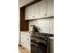 Modern kitchen features an elegant range, stone countertops, and stylish backsplash at 3186 E Stella Ln, Phoenix, AZ 85016