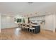 Bright, spacious kitchen features a large island with seating, light cabinets, and modern appliances at 3186 E Stella Ln, Phoenix, AZ 85016