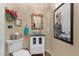 Stylish powder room features a decorative mirror and a vessel sink at 3221 N 37Th St # 10, Phoenix, AZ 85018