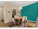 Bright dining room with wood table, colorful chairs, and a unique light fixture at 3221 N 37Th St # 10, Phoenix, AZ 85018