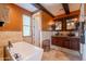 Bright bathroom featuring a soaking tub and a separate vanity area at 32311 N Cat Hills Ave, San Tan Valley, AZ 85144