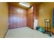 Well-organized garage featuring extensive cabinetry, offering plenty of storage and maximizing space at 32311 N Cat Hills Ave, San Tan Valley, AZ 85144