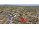 Desert home is nestled among desert landscaping and other single Gathering homes at 32516 N 68Th Pl, Scottsdale, AZ 85266