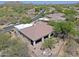 This home features a private backyard with a stone patio and seating area and mountain views at 32516 N 68Th Pl, Scottsdale, AZ 85266
