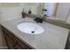 Close up of bathroom granite counter and sink with dark faucet at 32516 N 68Th Pl, Scottsdale, AZ 85266