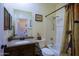 Bathroom with walk-in tub and designer shower curtain at 32516 N 68Th Pl, Scottsdale, AZ 85266