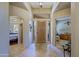 Foyer with tile flooring and a view of the front door and surrounding rooms at 32516 N 68Th Pl, Scottsdale, AZ 85266