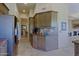 Open kitchen layout featuring stainless steel appliances and easy access to the living areas at 32516 N 68Th Pl, Scottsdale, AZ 85266