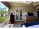 Bright main bedroom featuring backyard views and comfortable furnishings at 32516 N 68Th Pl, Scottsdale, AZ 85266