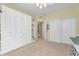 Bedroom with yellow walls, closet and built in storage in one wall at 3859 N El Sereno St, Mesa, AZ 85207